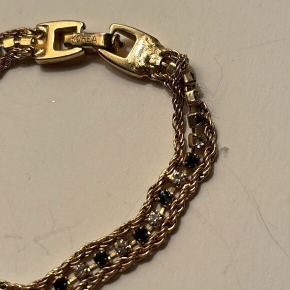 Gold Tone Rope Bracelet with Bezel set dark blue and clear stones - Picture 2 of 4